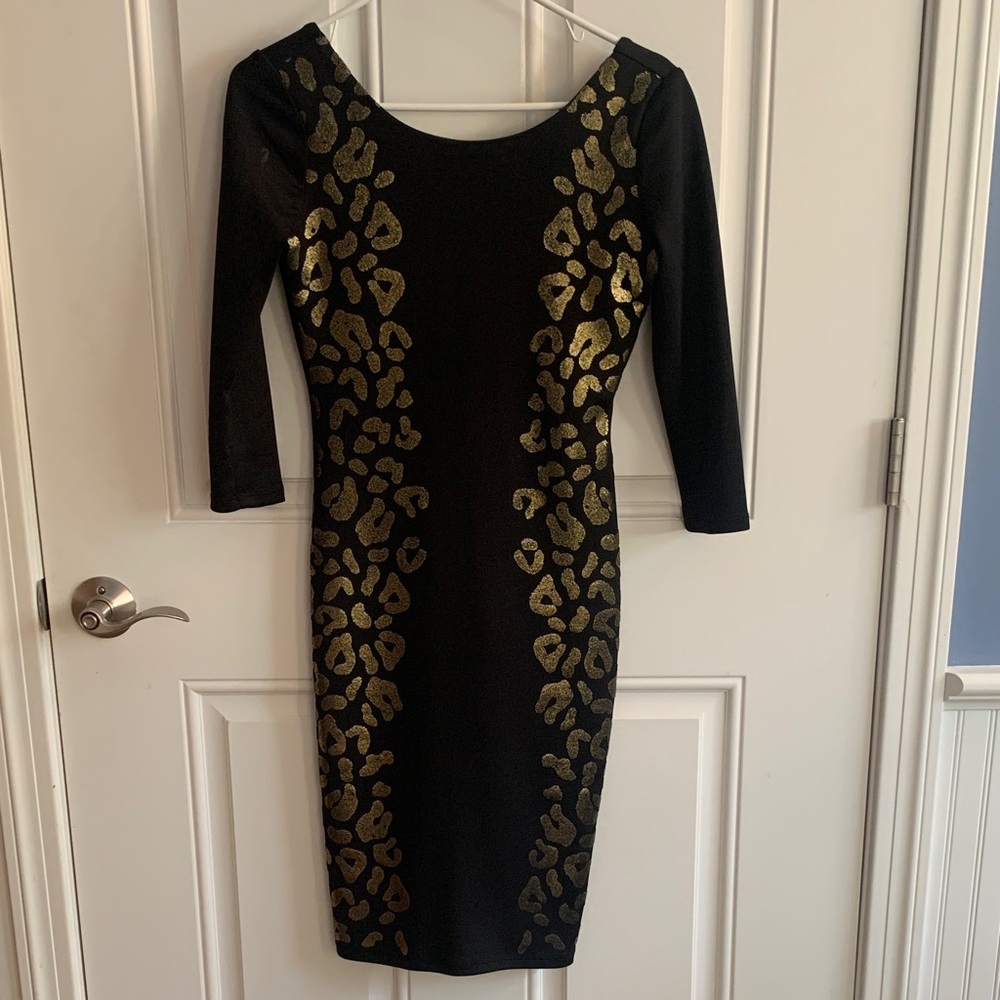 Gianni Bini Elegant Black Dress with Gold Patterns